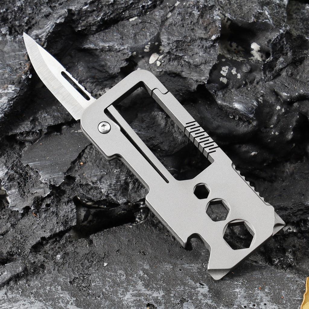 Titanium alloy buckle with VG10 folding knife