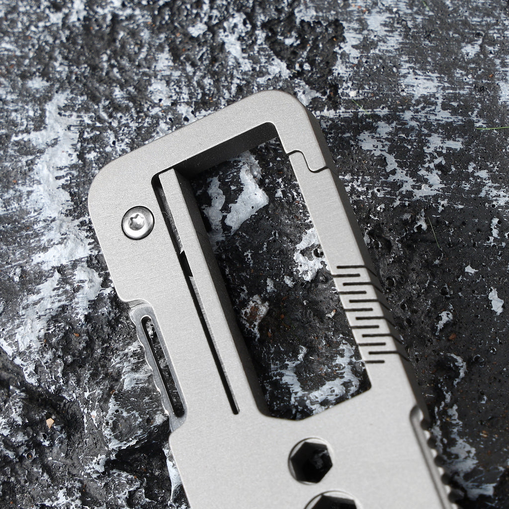 Titanium alloy buckle with VG10 folding knife