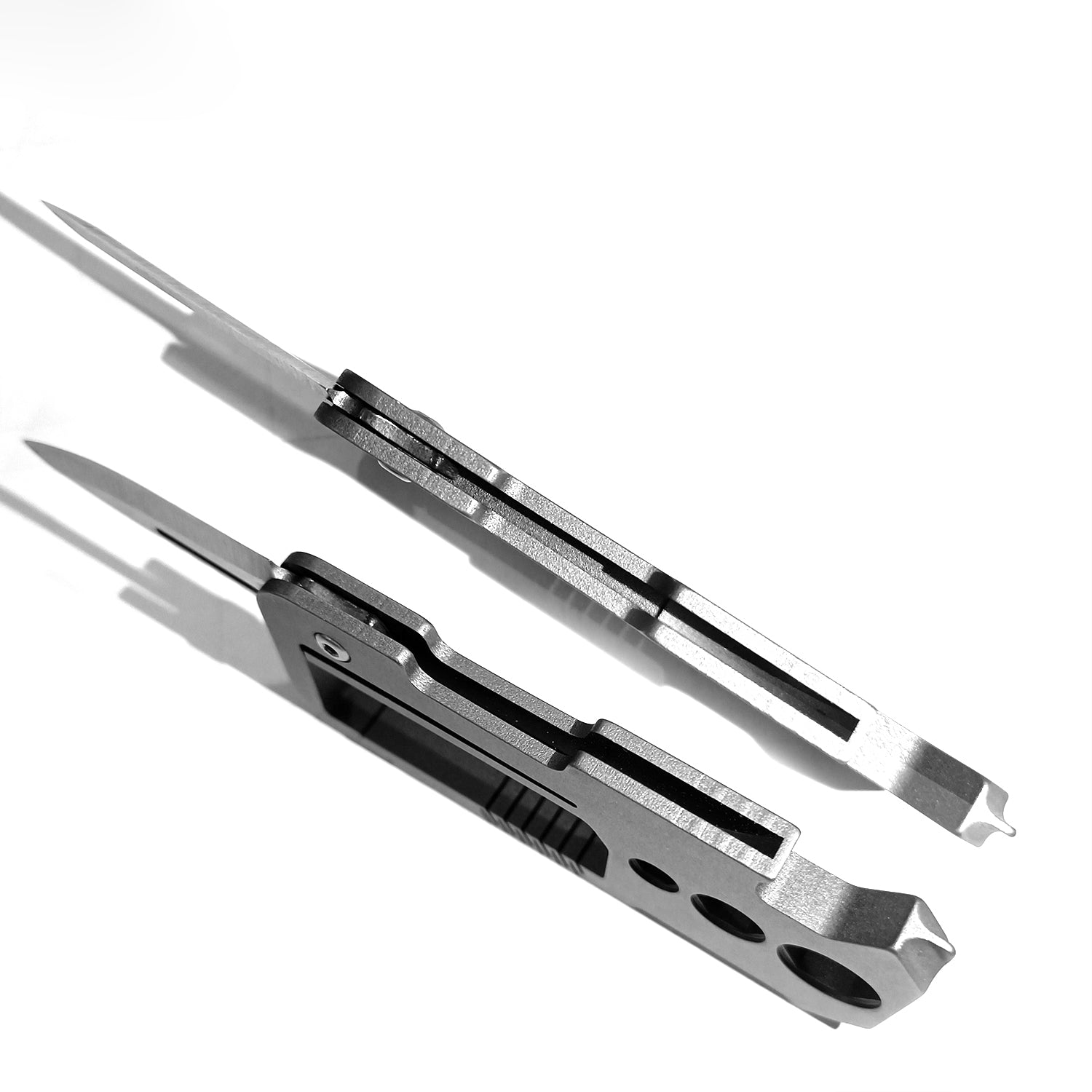 Titanium alloy buckle with VG10 folding knife